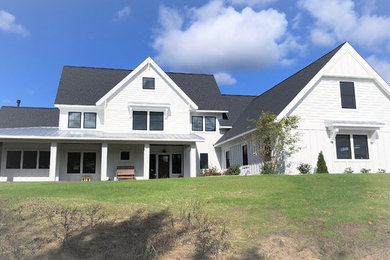 Example of a country exterior home design in Grand Rapids