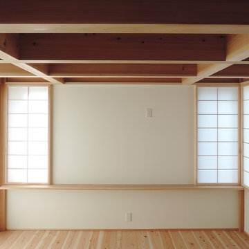 大らかに暮らすT字の住まい