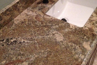 Drop-in bathtub - traditional master beige tile and ceramic tile ceramic tile drop-in bathtub idea in New Orleans with an undermount sink and granite countertops