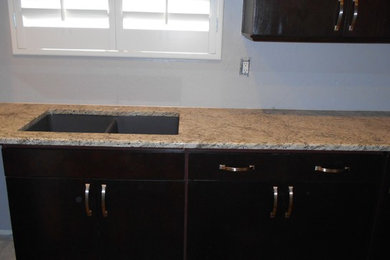 Condo Kitchen- Expresso Cabinets with Granite Antique White Countertops