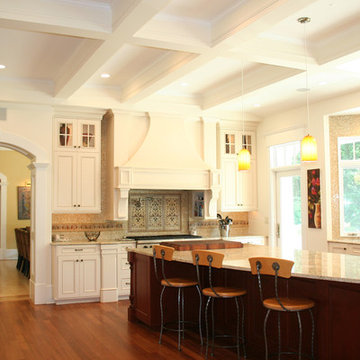 Expanded kitchen with traditional details and large island for entertaining
