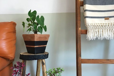Example of an eclectic home design design in Other