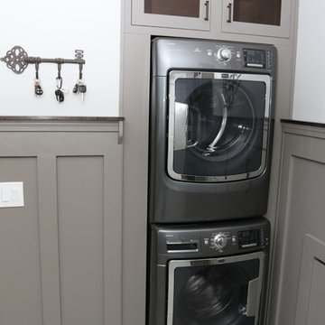 Space Saving Laundry Nook with Stackable Front Load Washer and Dryer
