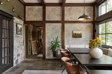Example of a mountain style dining room design in New York