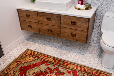 Alcove bathtub - mid-sized contemporary white tile and stone tile marble floor alcove bathtub idea in Other with flat-panel cabinets, medium tone wood cabinets, a one-piece toilet, white walls, a wall-mount sink and quartz countertops