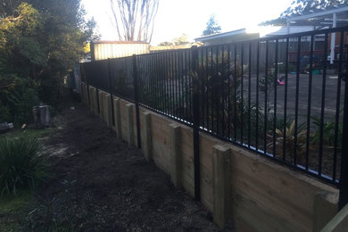 New retaining wall with fence