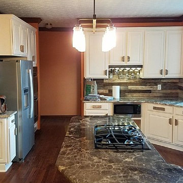 Custom Barnwood backsplash, kitchen accents, door and lighiting