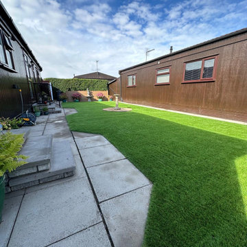 Artificial Lawn Beside a Paved Path at a Lodge