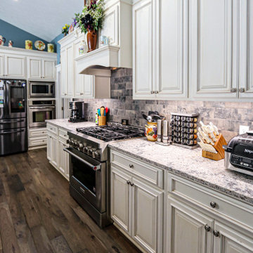 Updated Kitchen with Quartz Countertop, Tile Backsplash and Flooring
