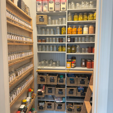 Apothecary-Style Pantry with Built-In Ladder and Vintage Details