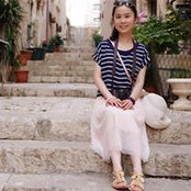 Qi Chens foto
