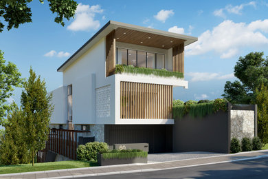 Large beach style three-storey concrete white house exterior in Gold Coast - Tweed with a flat roof, a metal roof and a white roof.