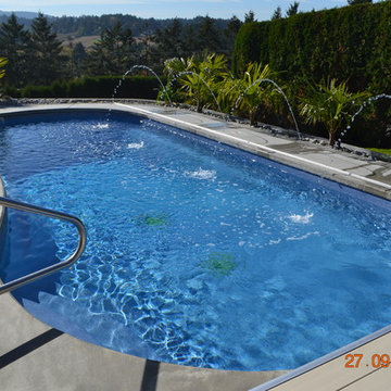Fibreglass Pool in Saanich with Beautiful Stone Walls