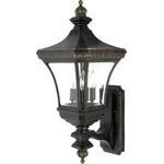 Quoizel Lighting - Quoizel Lighting Devon - Three Light Wall Lantern - Treat the exterior of your home with lighting worthy of the beauty and security your family deserves.  This transitional style with clear, beveled glass fits into most any neighborhood, and with most any architecture style.Devon Three Light Wall Lantern Imperial Bronze Clear Beveled Glass *UL Approved: YES *Energy Star Qualified: n/a  *ADA Certified: n/a  *Number of Lights: Lamp: 3-*Wattage:60w B10 Candelabra Base bulb(s) *Bulb Included:No *Bulb Type:B10 Candelabra Base *Finish Type:Imperial Bronze
