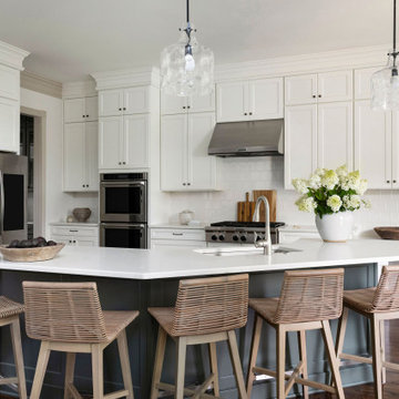 Classic White Kitchen with Contrast Island and Woven Seating