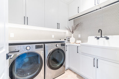 Example of an arts and crafts laundry room design in Vancouver