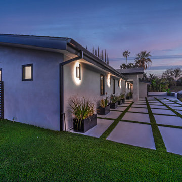 Side Yard and Driveway Lit at Twilight
