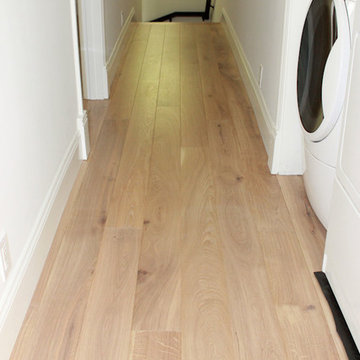 Refinish existing floors matching new floor installed.