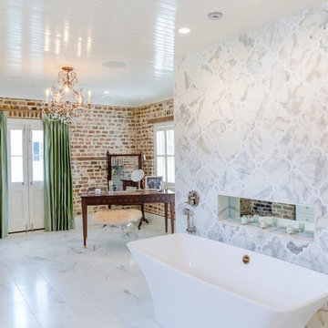 DAZZLING feature tile wall behind the tub.