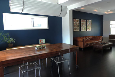 Living room - mid-sized modern enclosed dark wood floor living room idea in Chicago with blue walls
