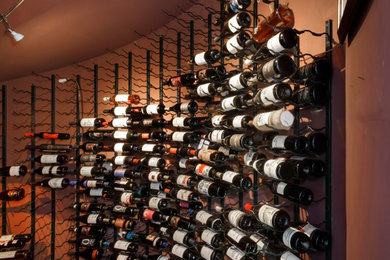 Inspiration for a contemporary wine cellar remodel in Orange County