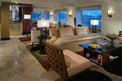 Inspiration for a large eclectic open concept limestone floor living room remodel in Other with white walls, a bar and a wall-mounted tv