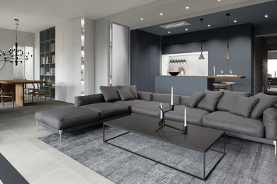 Idee per un soggiorno contemporaneo stile loft con pareti bianche, pavimento in gres porcellanato, pavimento beige e soffitto ribassato