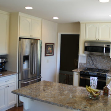 Refaced Cabinets with Wilmington Door in Buttercream.
