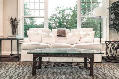 Inspiration for a timeless formal and open concept medium tone wood floor and brown floor living room remodel in New York with white walls, a standard fireplace, a stone fireplace and a tv stand