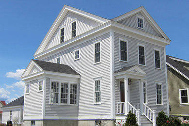 Mid-sized elegant home design photo in Portland Maine