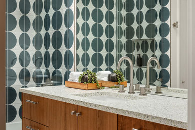 Bathroom - 1950s multicolored tile gray floor and single-sink bathroom idea in Seattle with flat-panel cabinets, medium tone wood cabinets, an undermount sink, gray countertops and a floating vanity