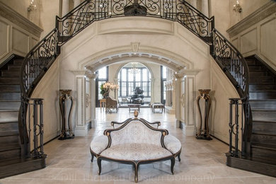 Photo of a large traditional foyer in St Louis with a double front door.