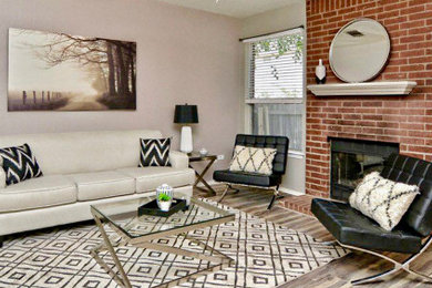 Example of a transitional living room design in Austin