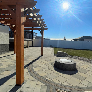 Modern Backyard Retreat with Dimensions Tofino Grey Pavers