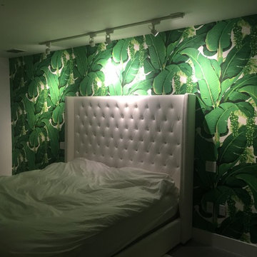 vintage wall-covering installation and flamingo wallpaper