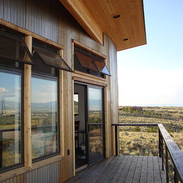 Crimson Bluffs Home- Custom Designed & Fabricated Awnings and Railing