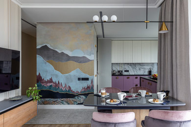 На фото: кухня-столовая среднего размера в современном стиле с бежевыми стенами, полом из ламината и бежевым полом с