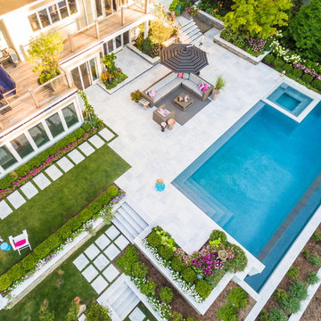 Luxury vanishing edge swimming pool and outdoor living area Ridgewood NJ