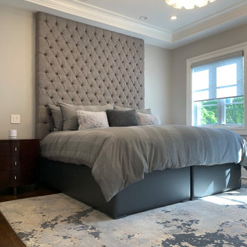 Custom tufted upholstered headboard with patterned fabric