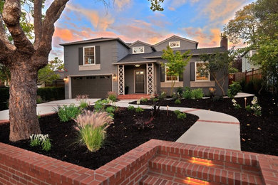 This is an example of a mid-sized traditional partial sun front yard mulch formal garden in San Francisco.