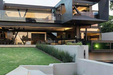 Example of a minimalist exterior home design in Albuquerque