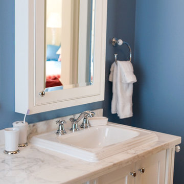 Blue Bathroom with A Double Vanity and Twin Medicine Cabinets