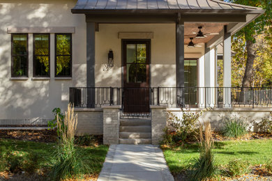 Inspiration for a french country porch remodel in Denver