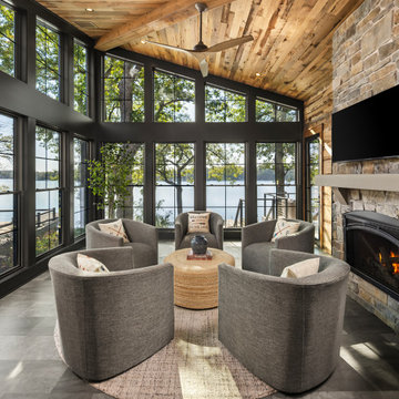 Antique Skim Oak Paneling and Weathered Antique Box Beams in a Lakeside Sunroom