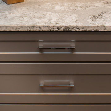 Kitchen | Two-Tone Cabinets | Cambria Quartz | Arabesque Marble Backsplash