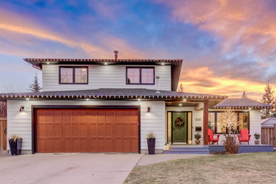 Contemporary gray two-story concrete fiberboard house exterior idea in Edmonton