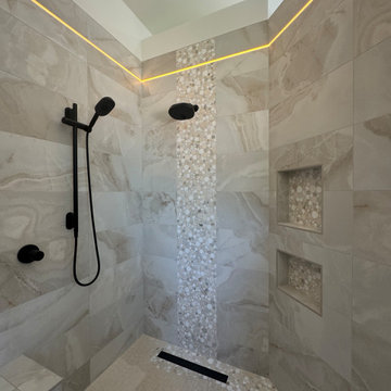 Curd-less walk-in shower; heated floors in bathroom + shower+bench LED