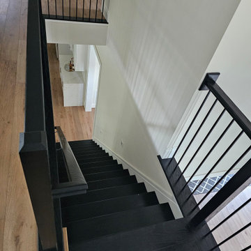 Project #130 | Curved Staircase with Wraparound Balcony