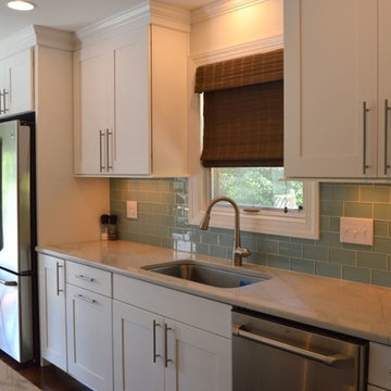 Kitchen Remodel with White Copenhagen Cabinetry and White Macauba Quartzite Tops