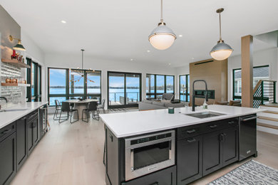 Inspiration for a modern kitchen remodel in Other with an island